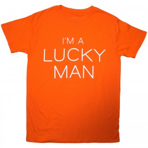 Richard Ashcroft Unisex T-Shirt: Lucky Man (Orange) (Small)